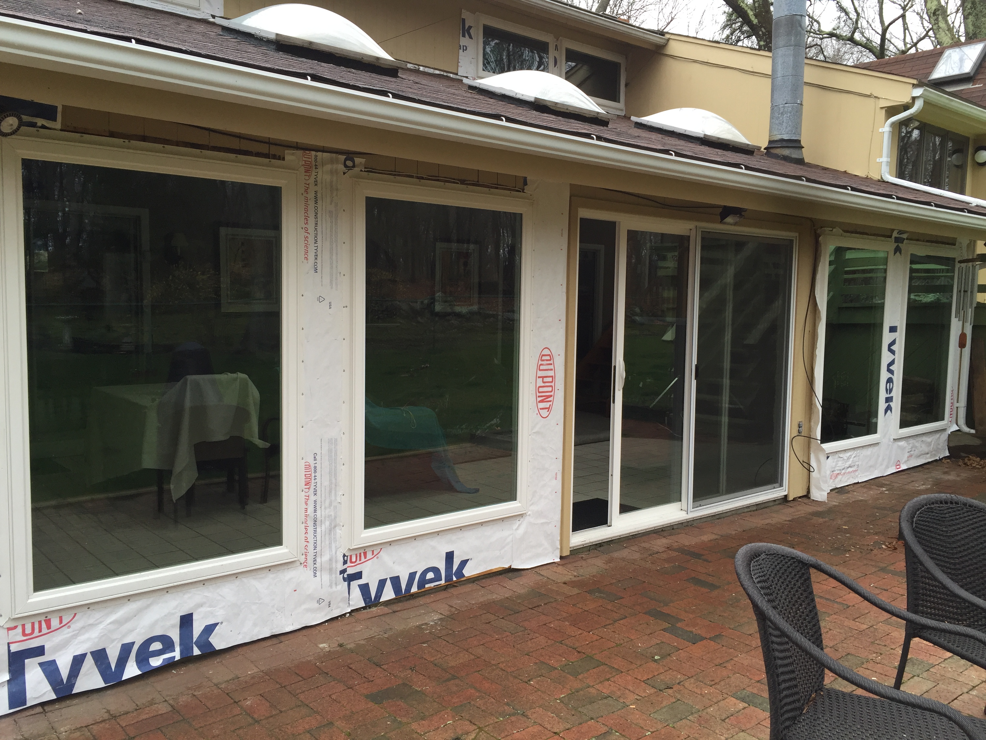 Large windows that have been installed after a full frame tear out.